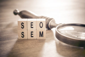 bigstock An Old Magnifying Glass Lying 250289671 SEO SEM
