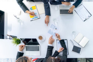 top view business team during meeting conference about marketing plan office 36650 218 Marketing Agency Marketing Strategy